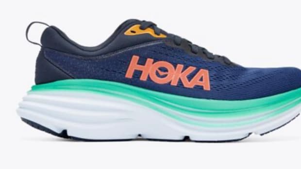 Navy, teal, and orange Hoka shoes.